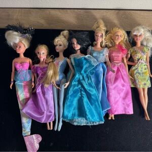 Barbie Dolls in Pink, Blue, and Multicolor Outfits